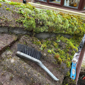 process of cleaning roof