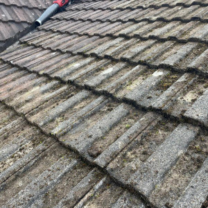 process of cleaning roof